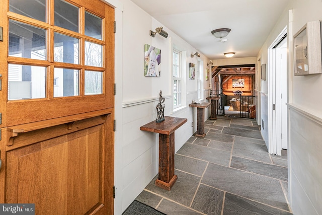 interior space with dark tile flooring