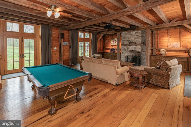 game room featuring french doors, light wood-type flooring, and pool table