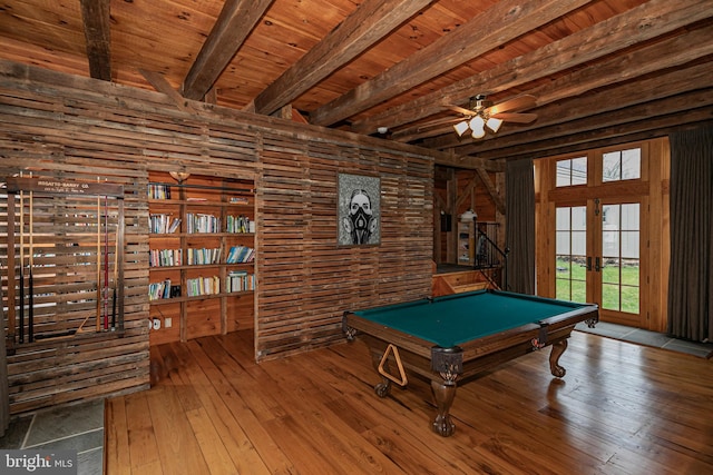 rec room featuring wood walls, french doors, wooden ceiling, pool table, and hardwood / wood-style flooring