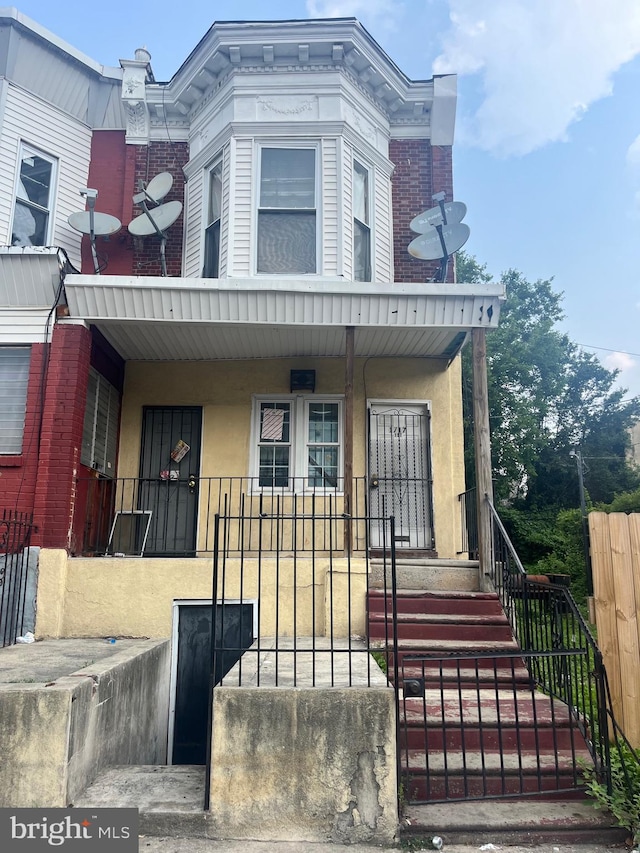 view of front of home with covered porch