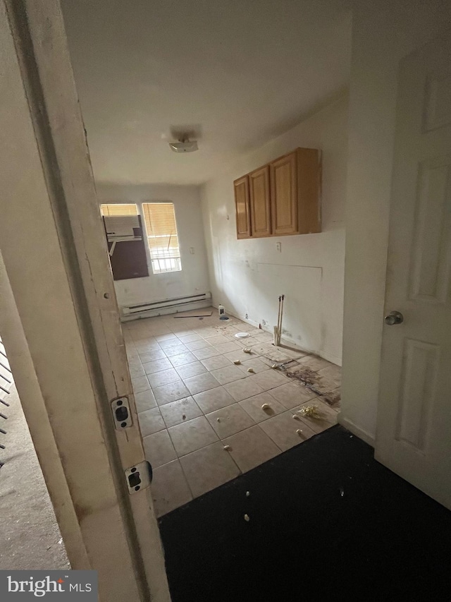 kitchen featuring a baseboard heating unit