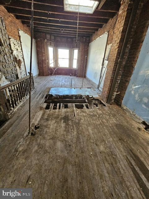 miscellaneous room featuring hardwood / wood-style flooring