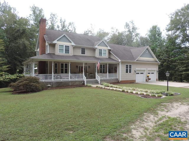 view of front facade featuring a front yard, a garage, and covered porch