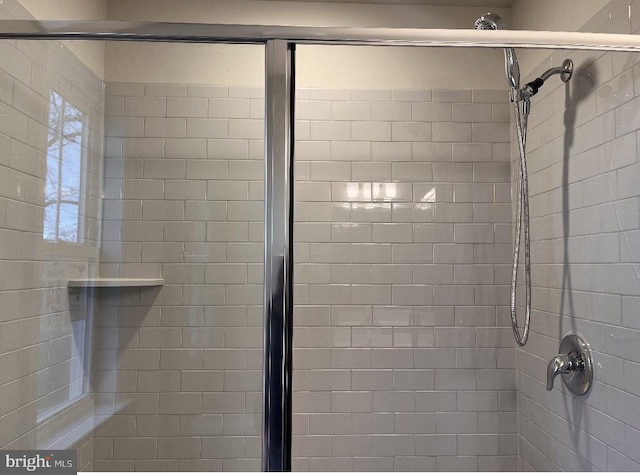 bathroom with an enclosed shower