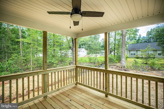 wooden terrace with ceiling fan