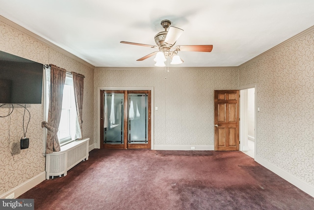 carpeted spare room featuring crown molding, radiator, and ceiling fan