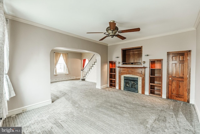 unfurnished living room featuring light carpet, ornamental molding, a baseboard radiator, and ceiling fan