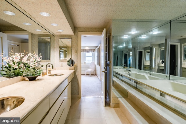 bathroom featuring tile floors, dual bowl vanity, and a textured ceiling