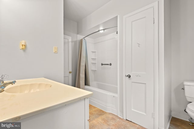 full bathroom with shower / bath combo, vanity, tile floors, and toilet