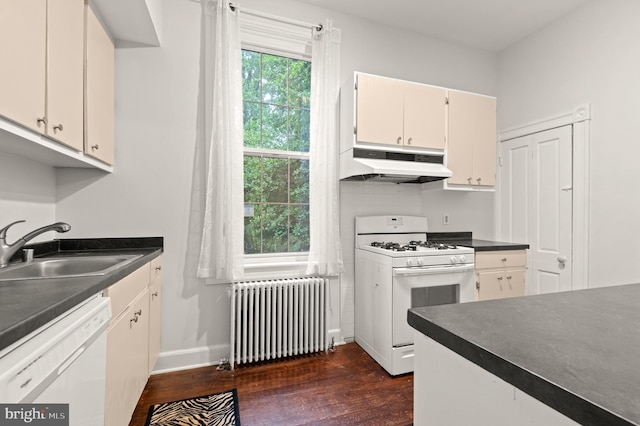 kitchen with white cabinetry, radiator, white appliances, and dark hardwood / wood-style flooring