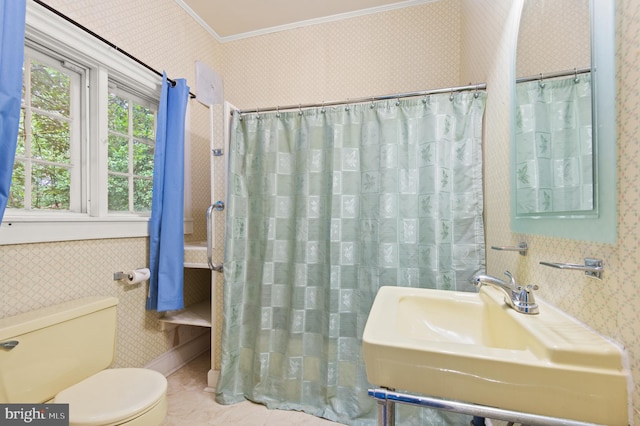 bathroom featuring tile walls, toilet, tile flooring, sink, and ornamental molding