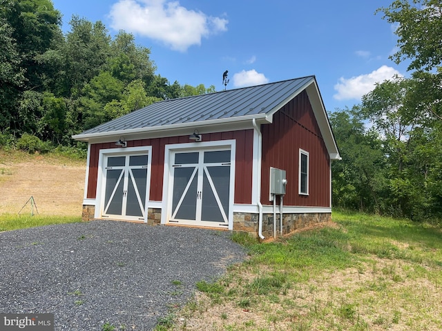 view of outdoor structure with a garage