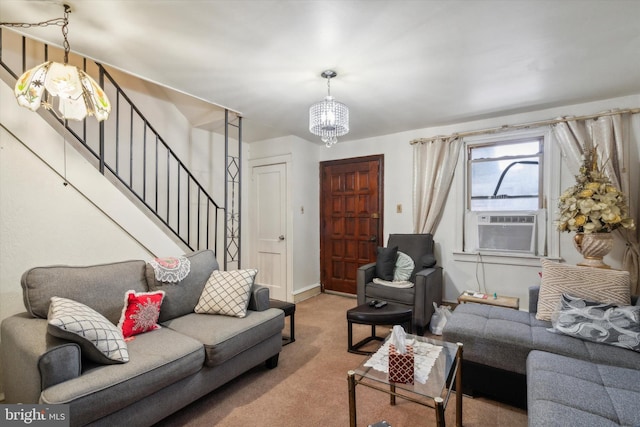 living room with an inviting chandelier and carpet floors