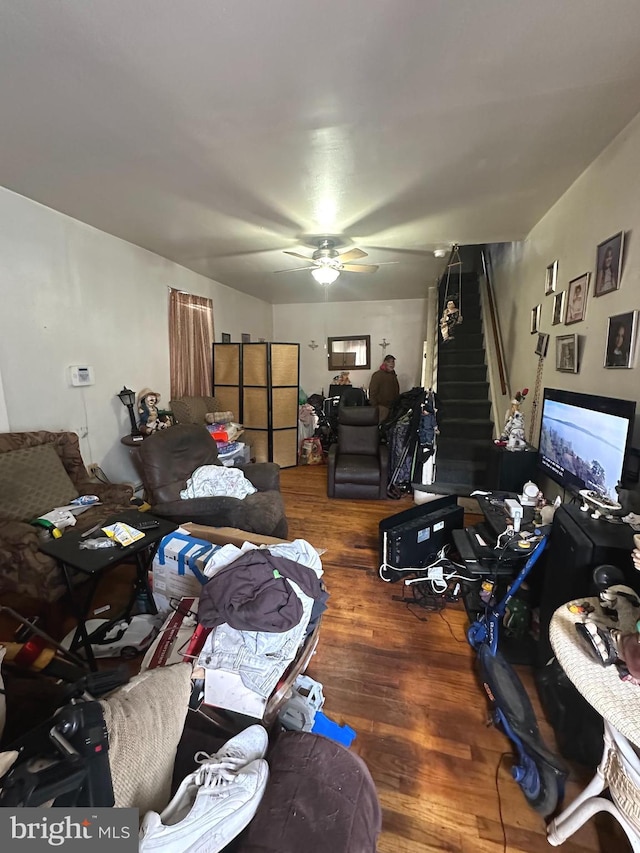 interior space with ceiling fan and hardwood / wood-style flooring