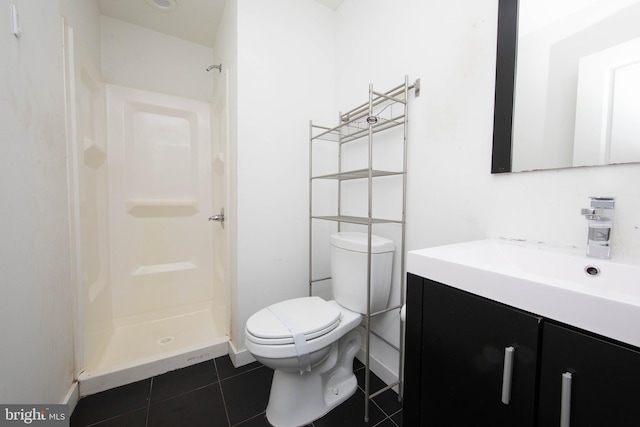 bathroom with walk in shower, vanity, toilet, and tile floors