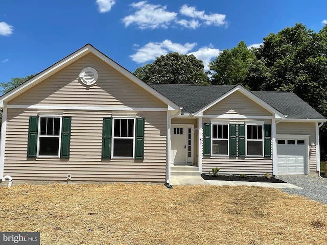 single story home featuring a garage