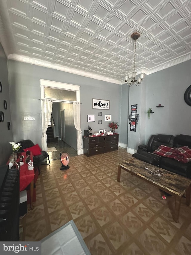 living room with an inviting chandelier