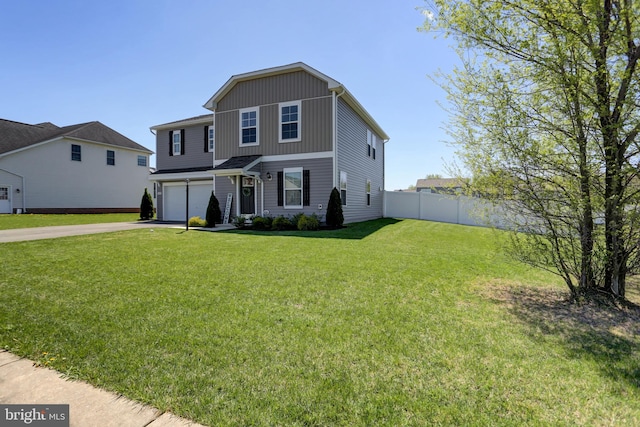 view of front facade with a garage and a front lawn