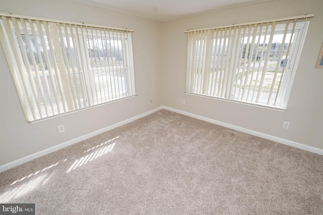 view of carpeted spare room