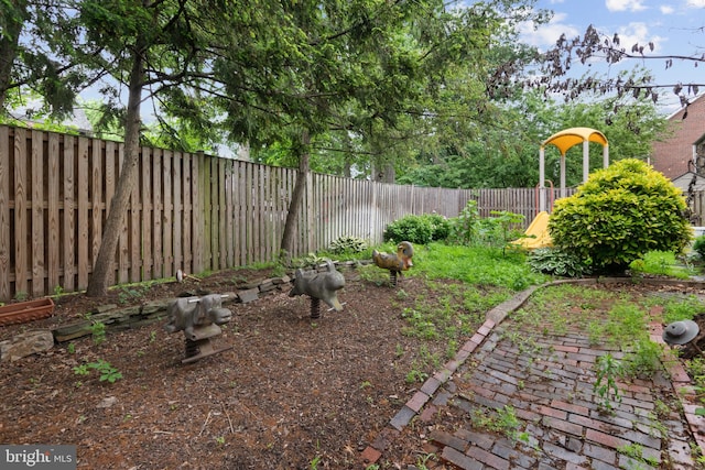 view of yard with a playground