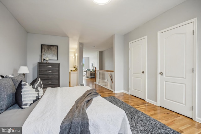 bedroom featuring hardwood / wood-style flooring