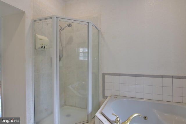 bathroom with independent shower and bath