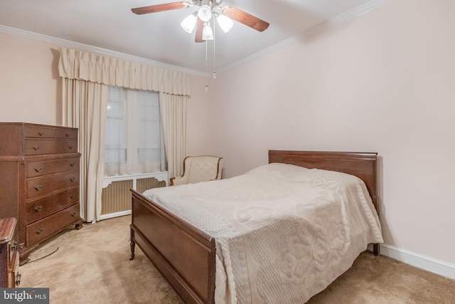 carpeted bedroom featuring ceiling fan, crown molding, and radiator heating unit