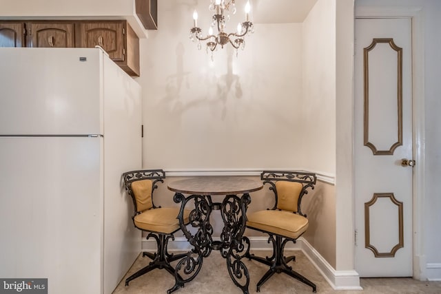 dining room featuring a chandelier