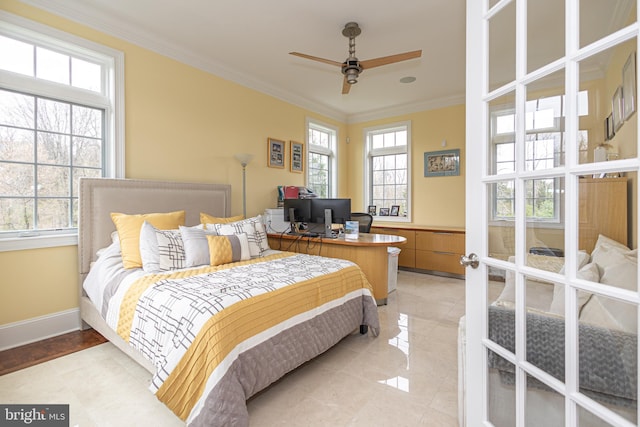 bedroom with baseboards, ornamental molding, and french doors