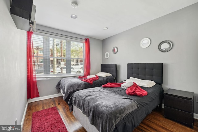 bedroom featuring dark hardwood / wood-style floors