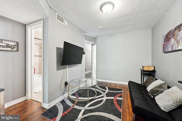 living room featuring dark hardwood / wood-style floors