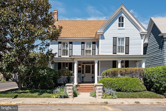 view of front of house with covered porch