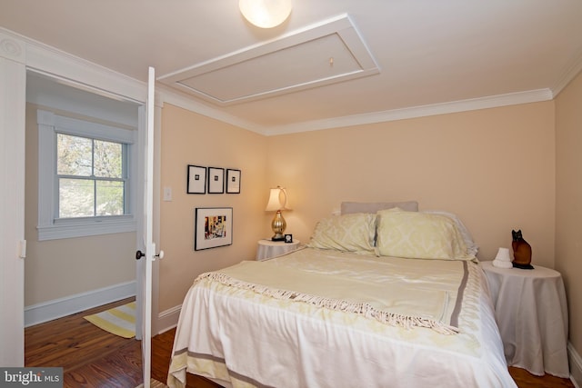 bedroom with hardwood / wood-style flooring and crown molding