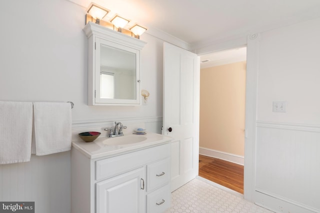 bathroom featuring tile floors and vanity