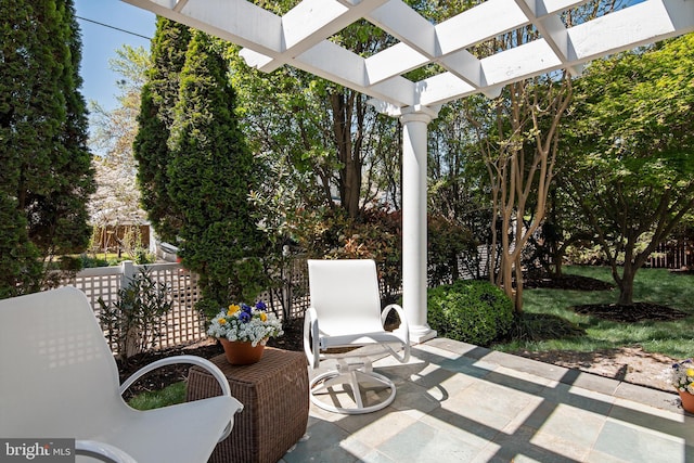 view of patio featuring a pergola