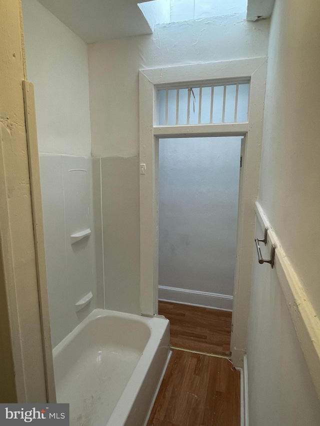 bathroom featuring wood-type flooring