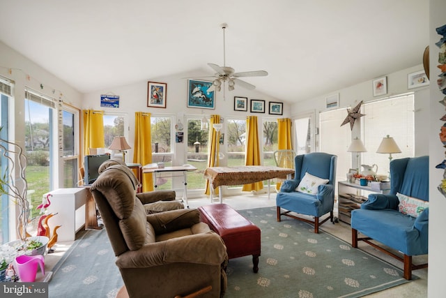 sunroom featuring ceiling fan and vaulted ceiling