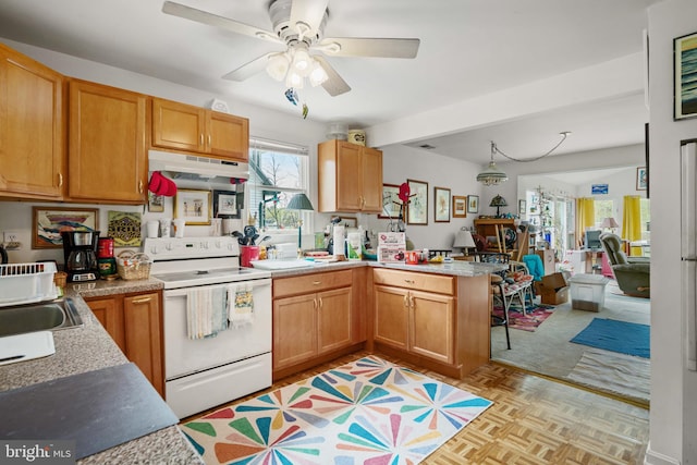 kitchen with kitchen peninsula, ceiling fan, light parquet flooring, sink, and white range with electric cooktop