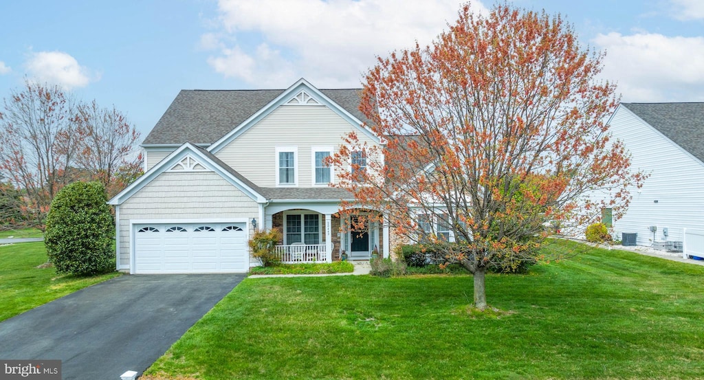 view of front of home featuring a porch and a front lawn