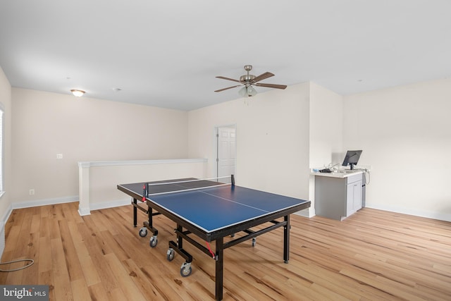 rec room featuring light hardwood / wood-style flooring and ceiling fan