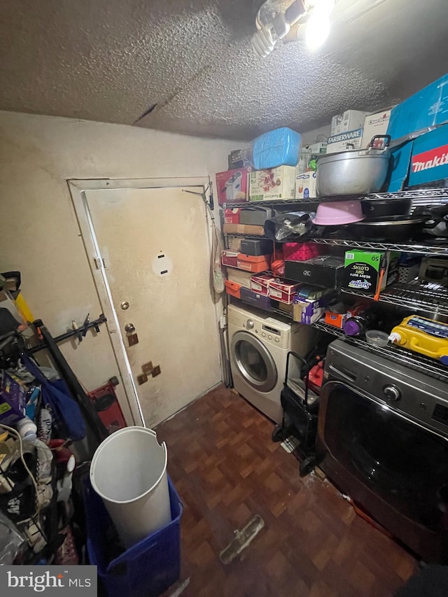 storage room featuring washer / dryer