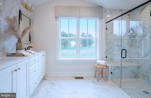 bathroom featuring walk in shower, lofted ceiling, tile floors, and dual bowl vanity