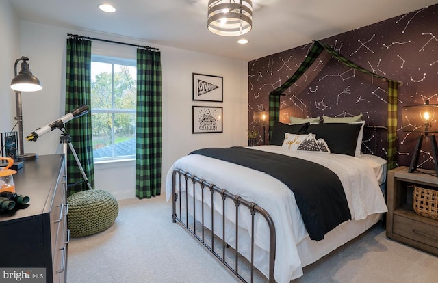 bedroom with light colored carpet