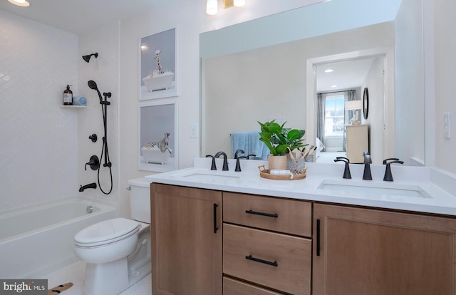 full bathroom with double vanity, toilet, and shower / tub combination