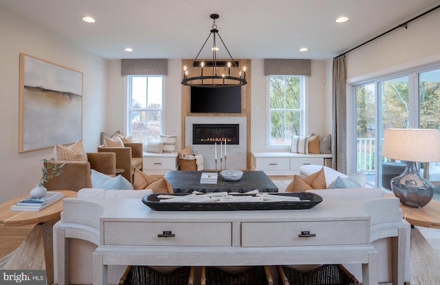 living room featuring an inviting chandelier