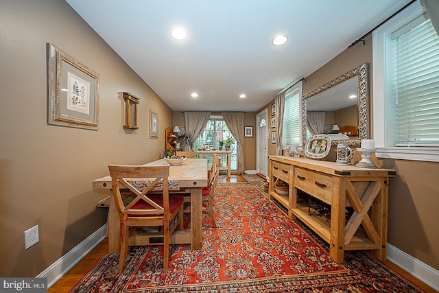 dining area featuring dark hardwood / wood-style flooring