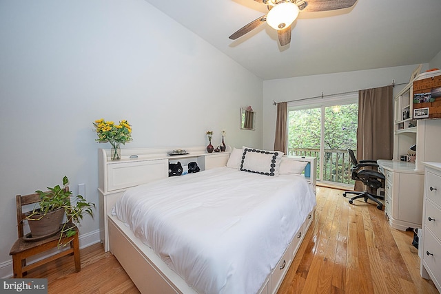 bedroom featuring access to outside, light hardwood / wood-style flooring, ceiling fan, and lofted ceiling