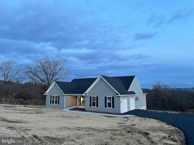 view of front of property featuring a garage