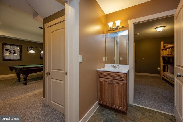 bathroom featuring pool table, vanity, and tile flooring