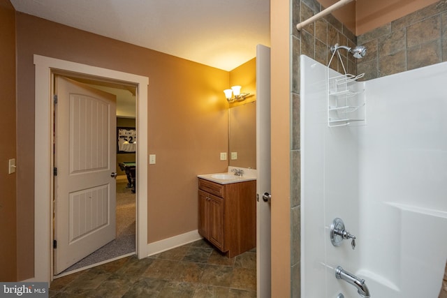 bathroom with tile flooring,  shower combination, and vanity